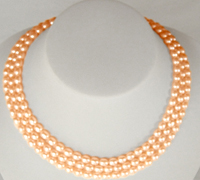 Triple strand of rice shaped pearl necklace